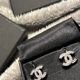 Boucles d'Oreille Style Channel